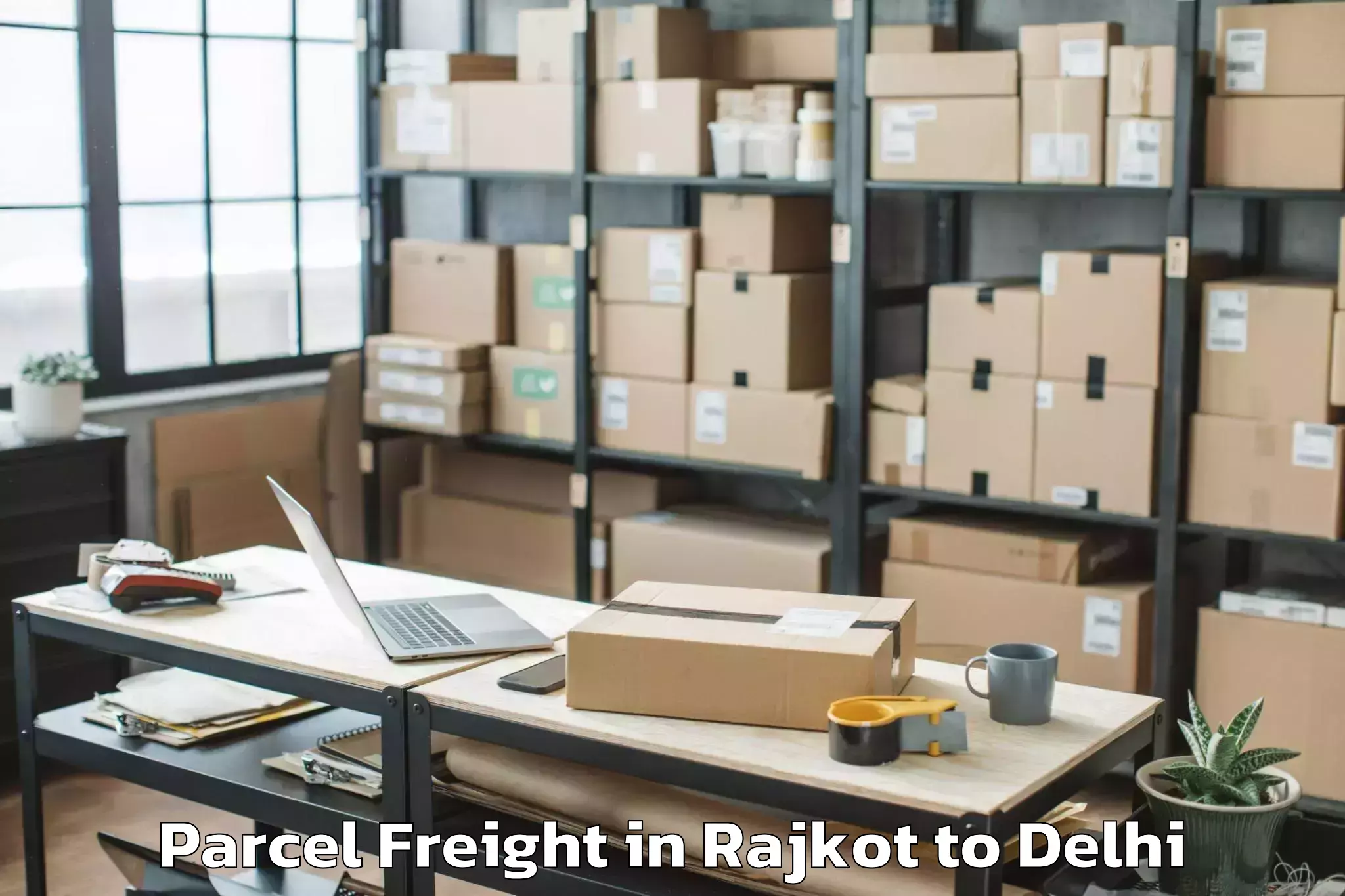 Affordable Rajkot to Seema Puri Parcel Freight